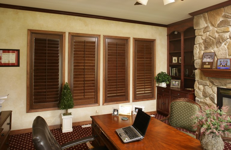 Wooden plantation shutters in a Boise home office